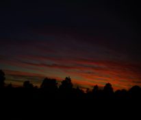 Colourful start to the day with beautiful streak of colours from the rising highlighting the clouds and the sky