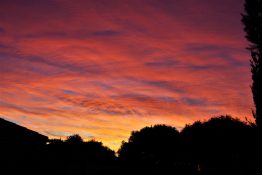 Colourful start to the day with beautiful streak of colours from the rising highlighting the clouds and the sky