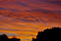 Colourful start to the day with beautiful streak of colours from the rising highlighting the clouds and the sky