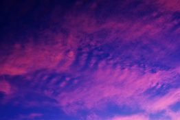 Colourful start to the day with beautiful streak of colours from the rising highlighting the clouds and the sky