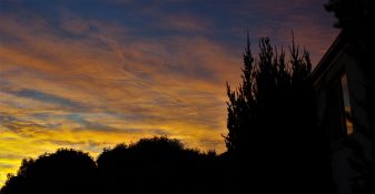 Colourful start to the day with beautiful streak of colours from the rising highlighting the clouds and the sky