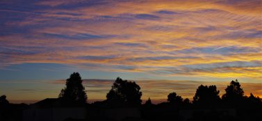 Colourful start to the day with beautiful streak of colours from the rising highlighting the clouds and the sky