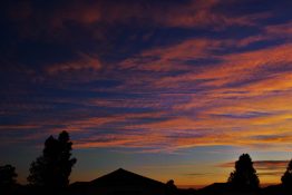 Colourful start to the day with beautiful streak of colours from the rising highlighting the clouds and the sky