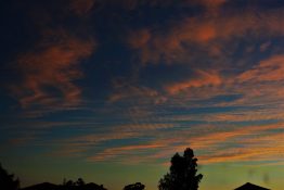 Colourful start to the day with beautiful streak of colours from the rising highlighting the clouds and the sky