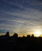 Sun rays on morning clouds