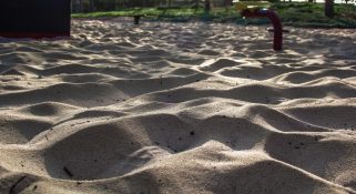 Kids park with play equipment built on sand