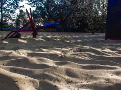 Kids park with play equipment built on sand