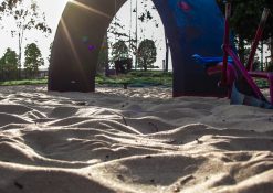 Kids park with play equipment built on sand