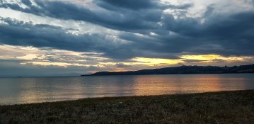 Beautiful sunset at Lake Taupou in New Zealand.