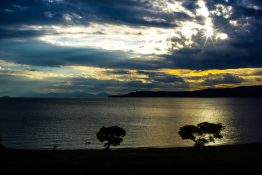 Magnificent golden sunset at Lake Taupou - New Zealand