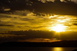 Magnificent golden sunset at Lake Taupou - New Zealand