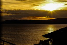 Magnificent golden sunset at Lake Taupou - New Zealand