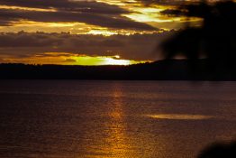 Magnificent golden sunset at Lake Taupou - New Zealand