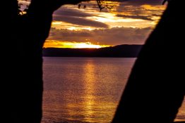 Magnificent golden sunset at Lake Taupou - New Zealand