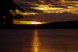 Magnificent golden sunset at Lake Taupou - New Zealand