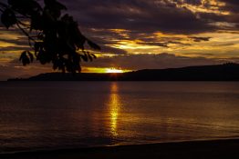 Magnificent golden sunset at Lake Taupou - New Zealand