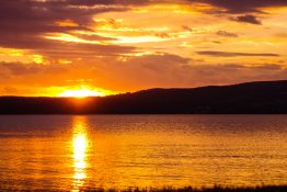 Magnificent golden sunset at Lake Taupou - New Zealand