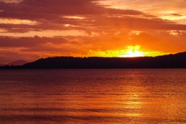 Magnificent golden sunset at Lake Taupou - New Zealand