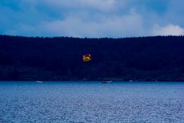 Parasailing at a distance in Lake Taupou - New Zealand