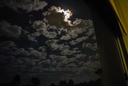 Full moon on a cloudy night