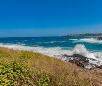 Huge waves crashing on the retainers in Kiama