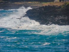 Huge waves crashing on the retainers in Kiama