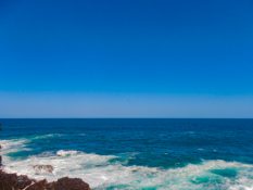 Huge waves crashing on the retainers in Kiama