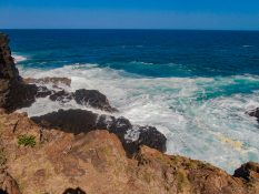 Huge waves crashing on the retainers in Kiama