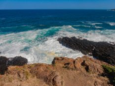 Huge waves crashing on the retainers in Kiama