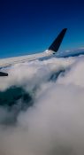 Beautiful view of ocean and clouds from a planes window