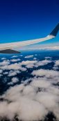 Beautiful view of ocean and clouds from a planes window