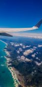 Beautiful view of ocean and clouds from a planes window