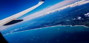 Beautiful view of ocean and clouds from a planes window