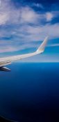 Beautiful view of ocean and clouds from a planes window