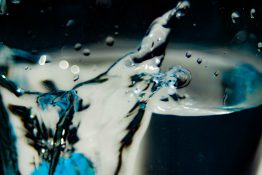 Water splashing out of a glass