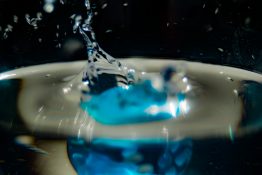 Water splashing out of a glass