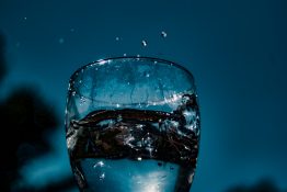 Water splashing out of a glass