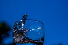 Water splashing out of a glass