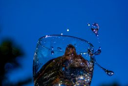 Water splashing out of a glass