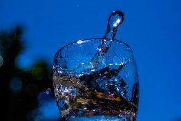 Water splashing out of a glass