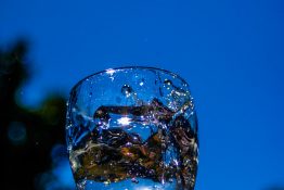 Water splashing out of a glass