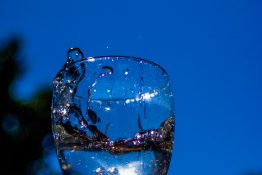 Water splashing out of a glass