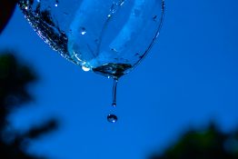 Water splashing out of a glass