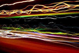 Long exposure shot of street lights from a moving car created a shaky line of streak of lights