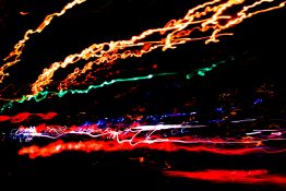 Long exposure shot of street lights from a moving car created a shaky line of streak of lights