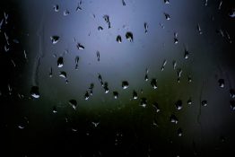 Rain drops on a bedroom window after a thunderstorm