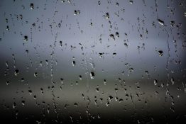 Rain drops on a bedroom window after a thunderstorm