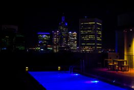 Swimming pool on a rooftop at night